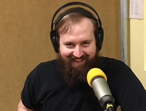 The mission of LARRS is to ensure that those who are print impaired have the same access to information as those who can read text. This is an image of assistant program director david kuskiein the broadcast studio
